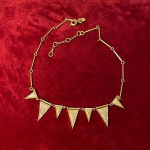 Gold tone J Crew necklace with great details.